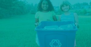 Teal image with two girls holding a recycling bin