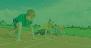 Green image of kids about to race on a track