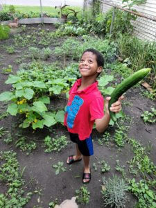 Dove student with cucumber